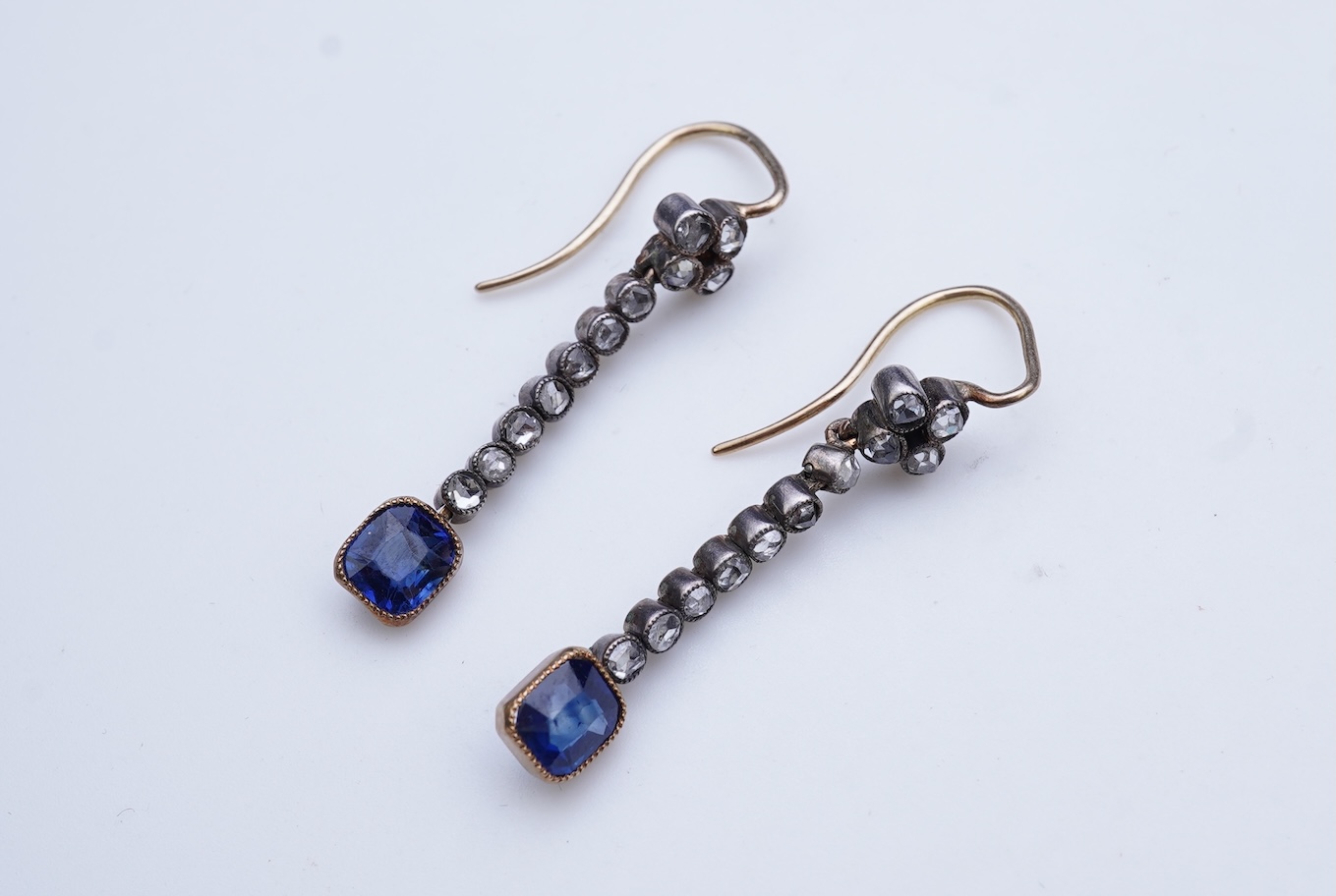 A pair of sapphire and diamond earrings, early 20th century
